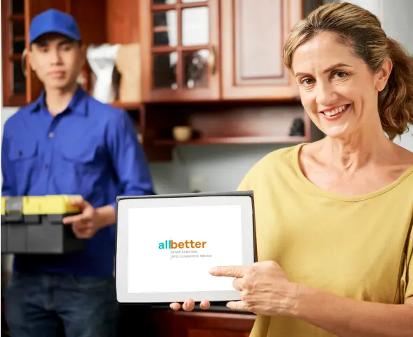 Contractor showing AllBetter Field app to a colleague